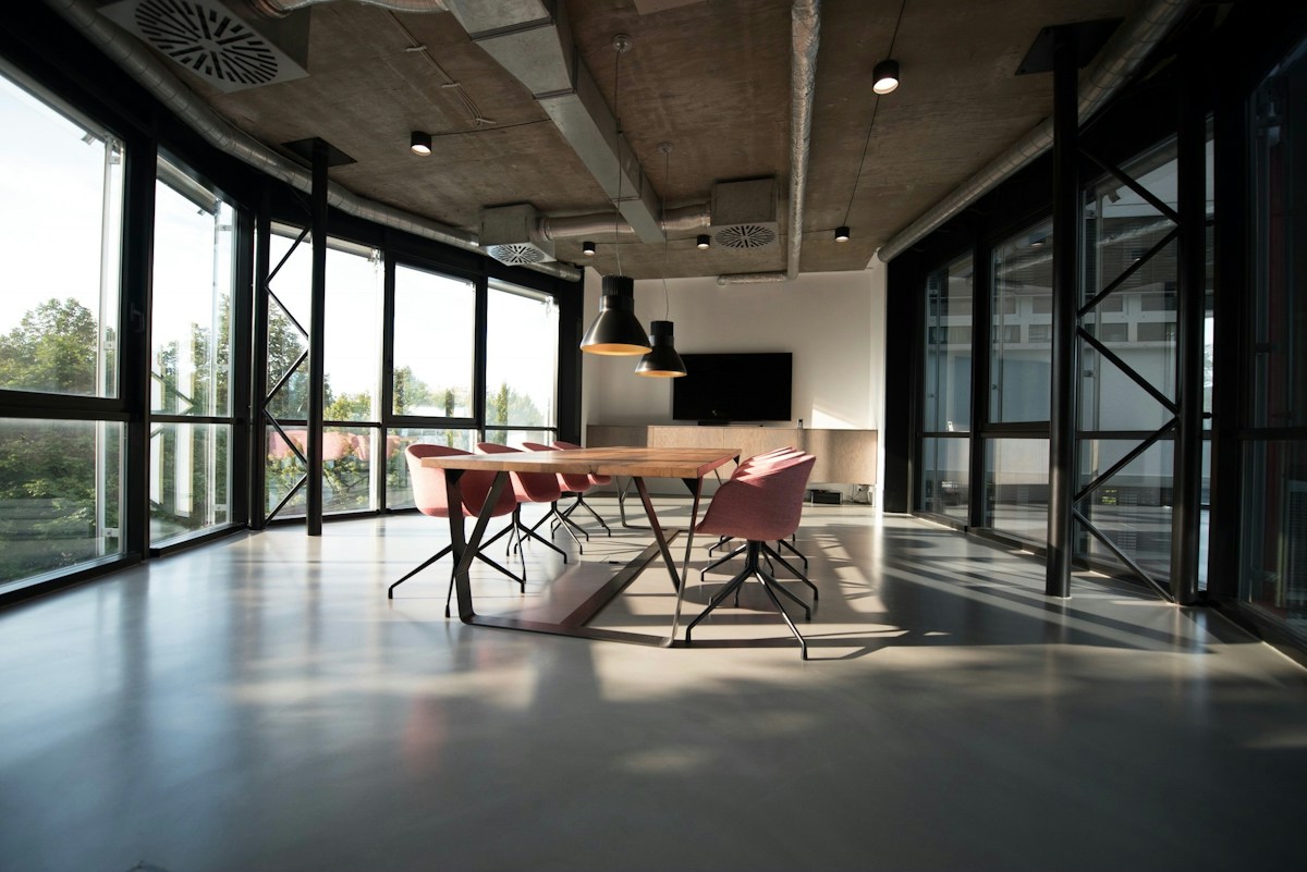 Open workspace with clear pathways and natural light, reflecting accessible digital experiences